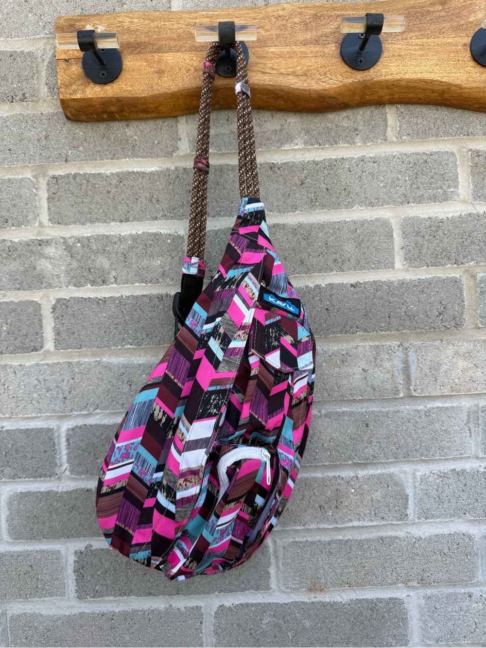 Kavu Pink, Brown & Teal Geometric Sling Backpack